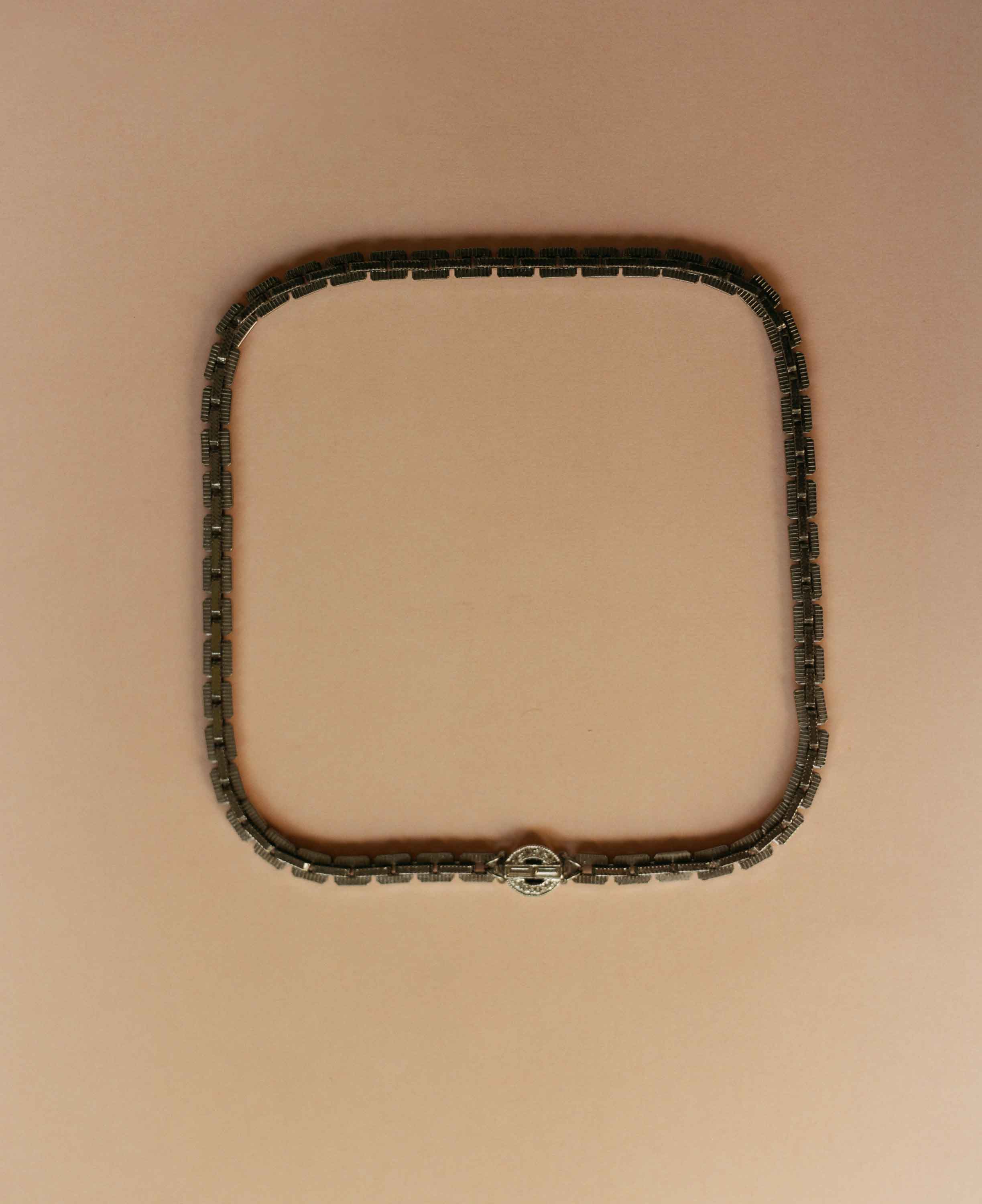 Necklace on a beige background