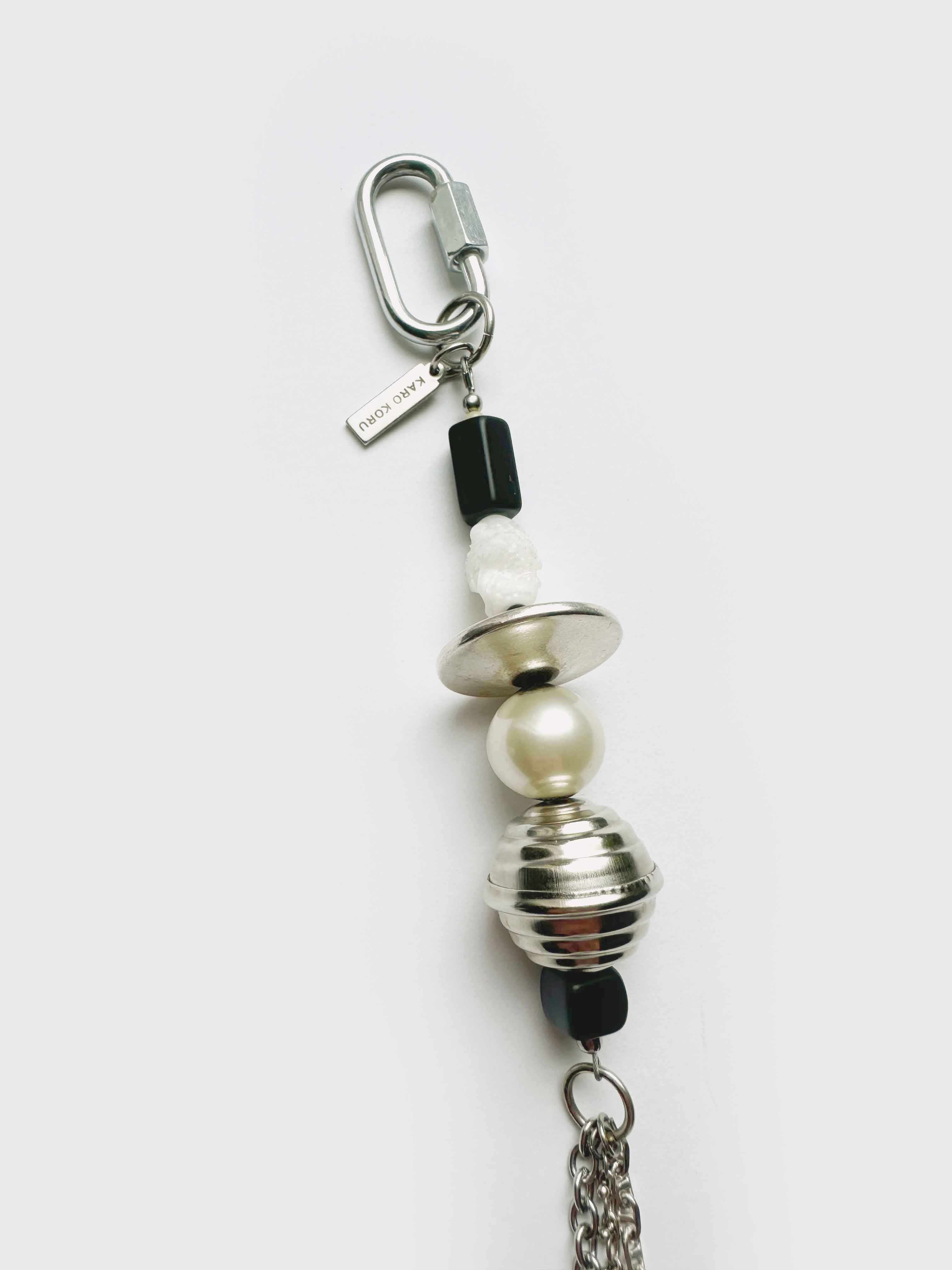 Keychain with beads and a carabiner on a white background