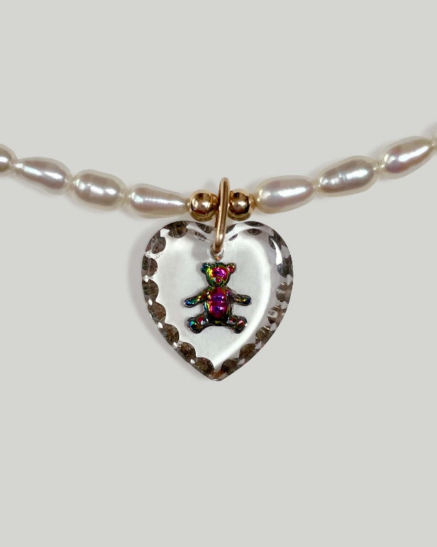 Elegant heart-shaped pendants on chains - some with gemstones, symbols –  Khalsa Raj