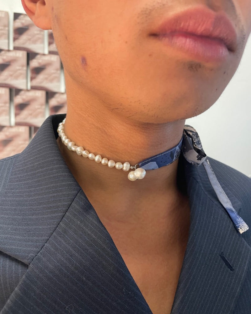 white pearl necklace with vintage ribbon tie